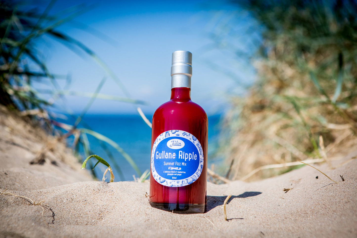 Large Bottle of Gullane Ripple Summer Fizz Mix with beach in background