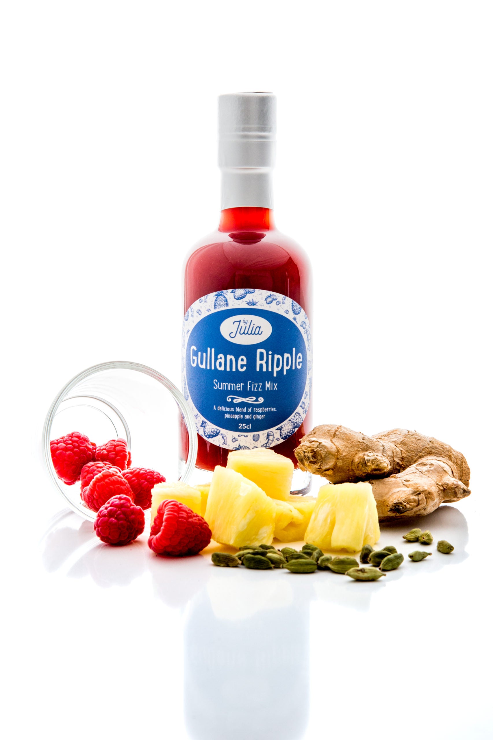Large Bottle of Gullane Ripple Summer Fizz Mix on white background with pineapple, rasperries and ginger